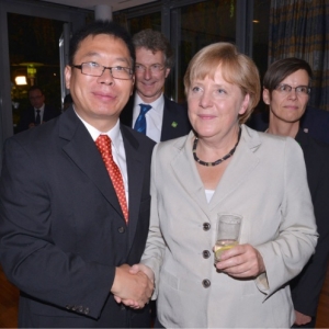 Steve Zhao et Angela Merkel